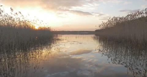 Sunset in the boat on the lake Stock Footage 64848678