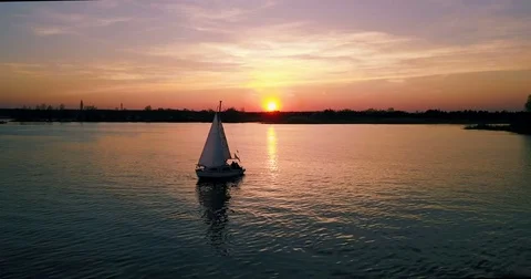 Sunset with boat  over the river Stock Footage 74638948