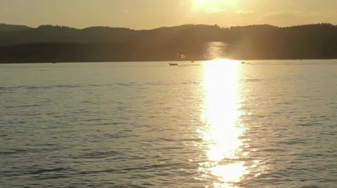 Sunset With Boats on Lake CDA 库存影片 32359470