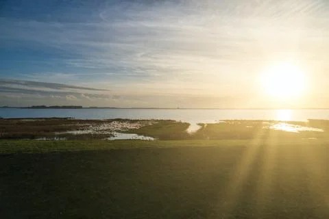Sunset on the Bodden in Zingst on the Baltic Sea peninsula. Nature reserve Stock Photos