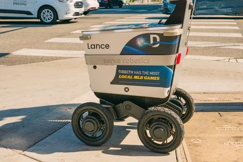 Sunset Boulevard Robotic delivery. The Server robot drives itself down the .. Stock Photos