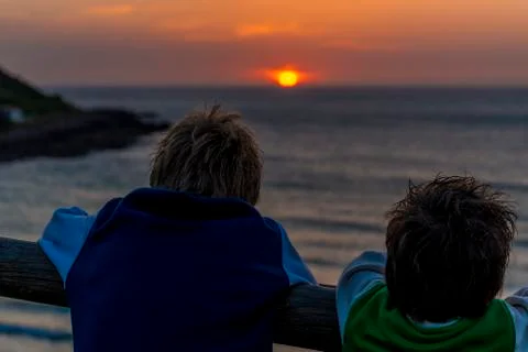 Sunset boys Stock Photos