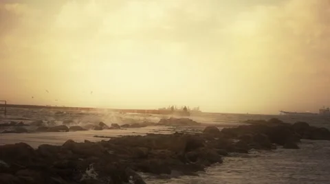 Sunset on the breakwater into the sea Stock Footage 55562859
