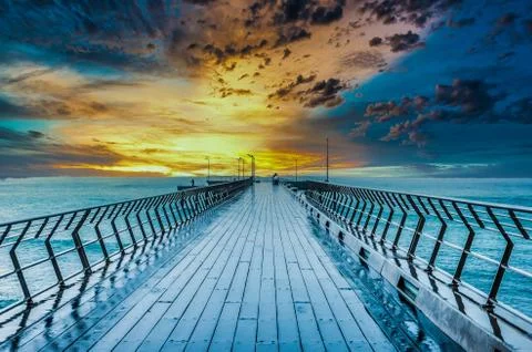 Sunset from Bridge on the beach. Stockfoto's