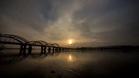 Sunset. bridge over the river. very beautiful reflection of clouds in water Stock Footage 72158346