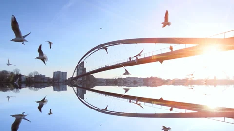 Sunset bridge panorama. mirror water reflection.slow motion Stock Footage 33822768