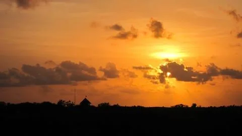 Sunset with bright orange sky Foto stock