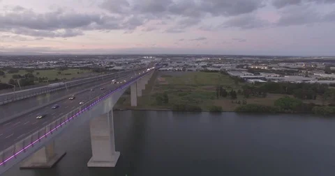 Sunset at Brisbane gateway bridge beautiful aerial view  traffic from air Stock Footage 102821423