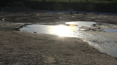 Sunset on a bubbling pond 4K Stock Footage 68059353