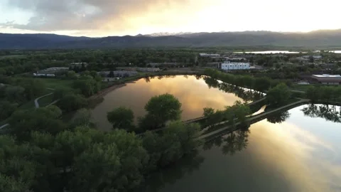Sunset in business lake - Drone camera moves right Stock Footage 137858997