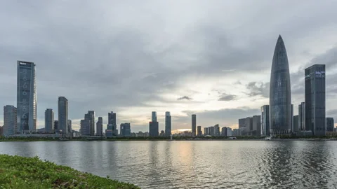 Sunset in a bustling modern city Stock Footage 138784217