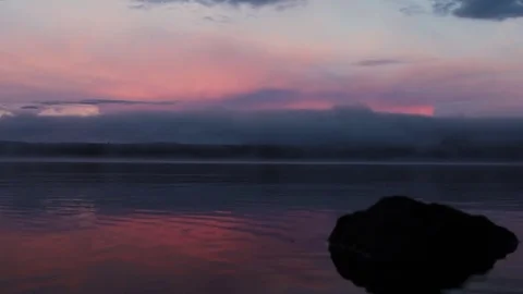 Sunset on calm lake Stock Footage 81249401