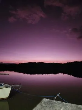 Sunset on a Calm Lake Stock Photos