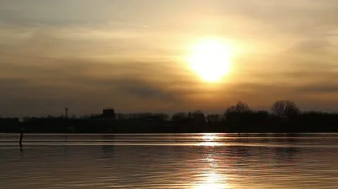 Sunset on calm river water Stock Footage 10883103