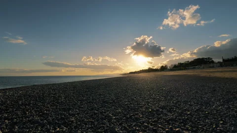 Sunset by the calm sea Stock Footage 257944986