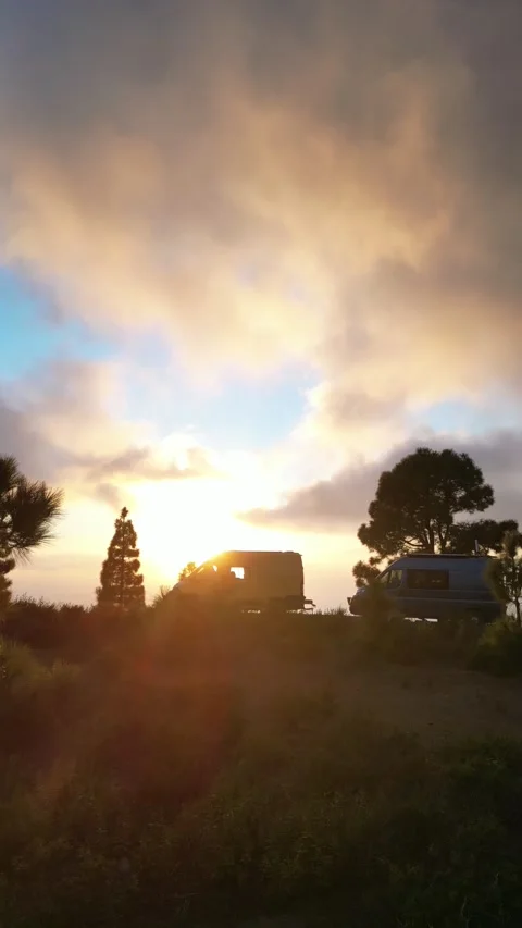 Sunset Camper Vans Silhouettes Drone Shot Footage 4K Vertical Stock Footage 233222604
