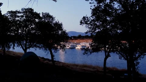 Sunset, camping near the water Stock Footage 249242445