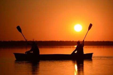 Sunset Canoeing Stock Photos
