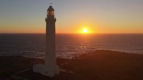 Sunset Cape Leeuwin Lighthouse Over Open Southern and Indian Oceans From Cliff Stock Footage 326571793