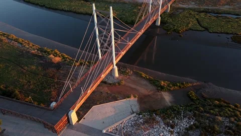 Sunset captures sleek bridge design with cables and towers Stock Footage 345222671