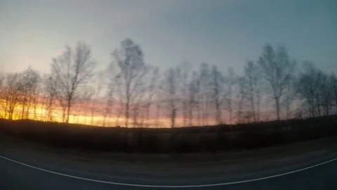 Sunset in the car window Stock Footage