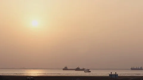 Sunset with cargo boats Stock Footage 111599853