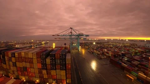 Sunset Cargo Container ship loading and unloading in deep sea port. Stock Footage 219937498