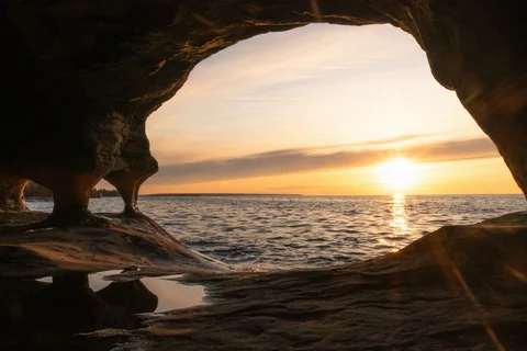 Sunset from cave on lake Stock-Footage 128160671