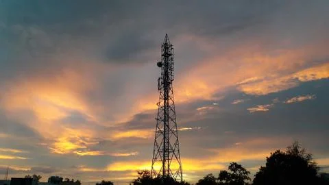 Sunset with cellular tower Stock Photos