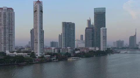 Sunset on the Chao Phraya River in the city of Bangkok Stock Footage 245788557