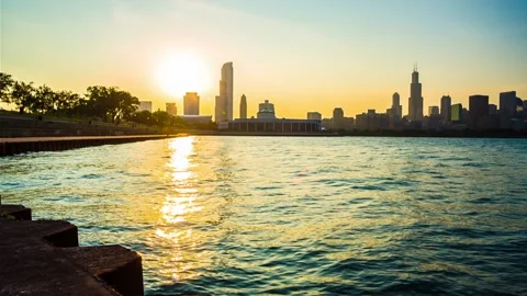 Sunset with Chicago's skyscrapers in the background Stock Footage 233697139