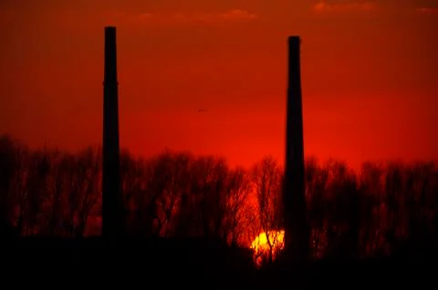 Sunset chimneys Stock Photos