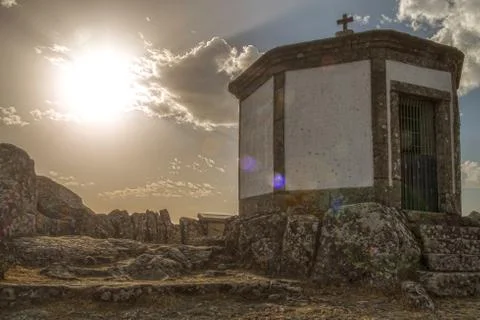 Sunset with church Stock Photos