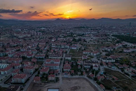 Sunset with city and Mountain view - Golden Hour Drone Footage Vídeo Stock 197584481
