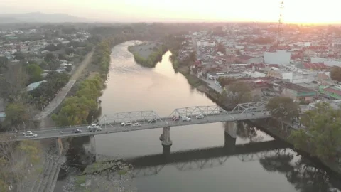 Sunset on the city bridge Stock Footage 153516537