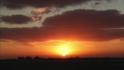 Sunset city in construction skyline - timelapse Stock Footage 81495378