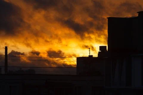 Sunset in the city. Fire sunset Stock Photos