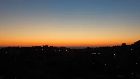 Sunset on the city by the sea Stock Footage 116593058