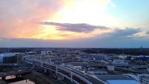 Sunset Cityscape | Highway Interchange | Road - 4K Aerial Video Stock Footage 333195342