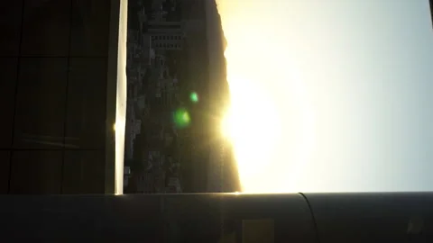 Sunset cityscape from hotel room Stock Footage 226381506