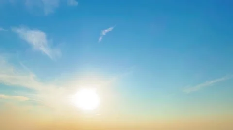 Sunset clear blue sky 4k time-lapse video. Sun shine moving nature background Stock Footage 68583508