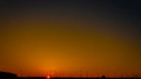 Sunset with clear sky, plenty of copy space Stock Illustration