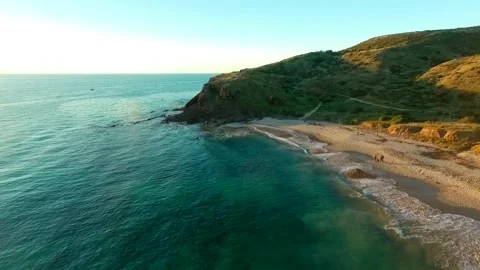 Sunset on cliffs with ocean aerial Stock Footage 262208639