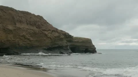 Sunset Cliffs - Pelicans fly over Stock Footage 21538150