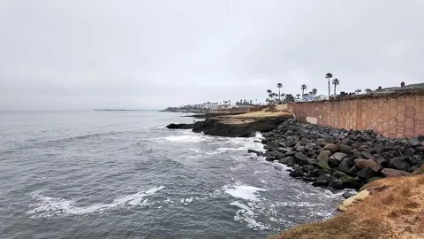 Sunset Cliffs sea cave in San Diego California waves crashing against the Stock Footage 279541664