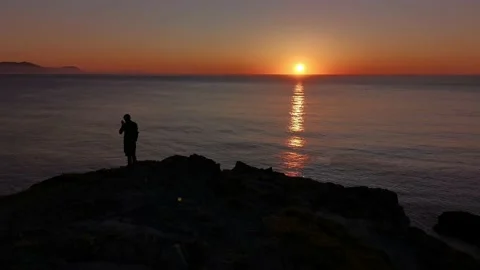 Sunset from the cliffs in a sunny day Stock Footage 130856928