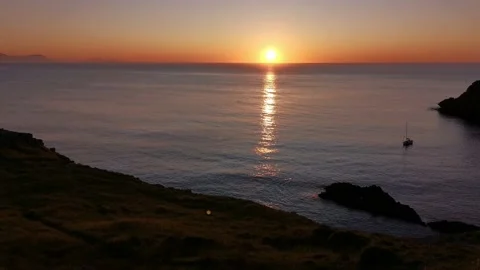 Sunset from the cliffs in a sunny day Stock Footage 130856966
