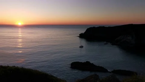 Sunset from the cliffs in a sunny day Video stock 130857018
