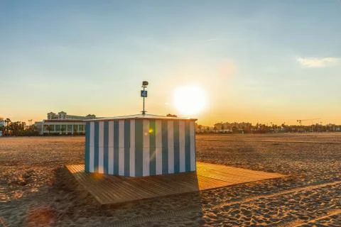The sunset clock on the beach of Malvarros on a clear day. Valencia, Spain Stock Photos