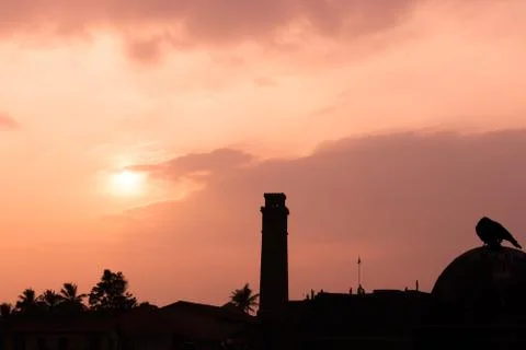 Sunset with clock tower gall sri lanka Stock Photos